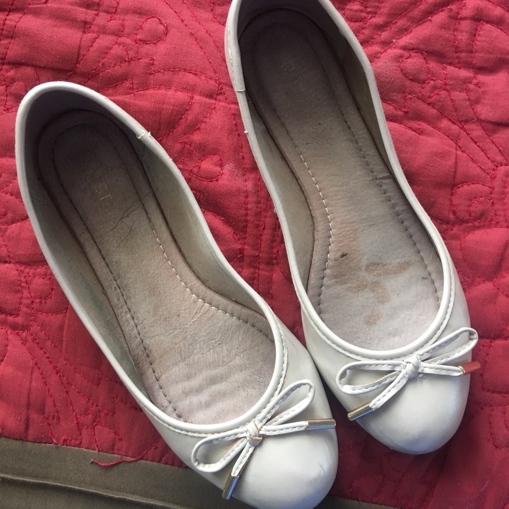 Nude ballet flats with bowties size 8